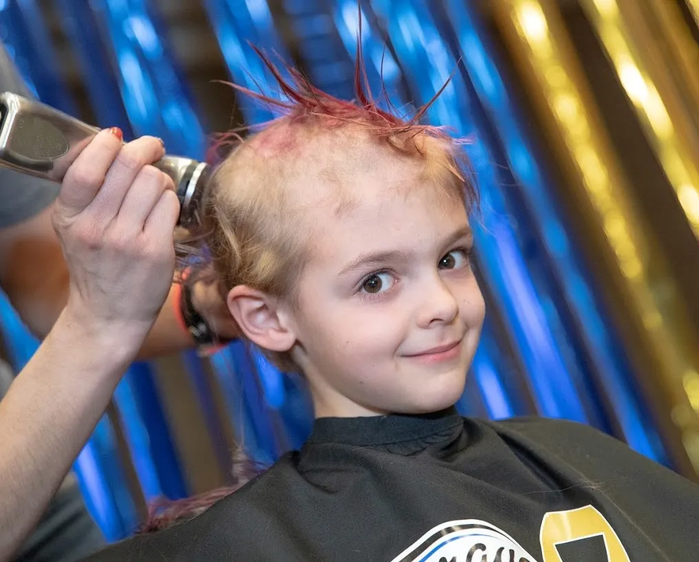 Child shaving head